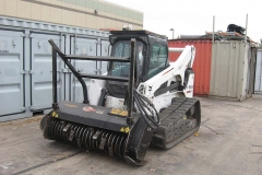 SKID STEER LOADER AND ATTACHMENT
